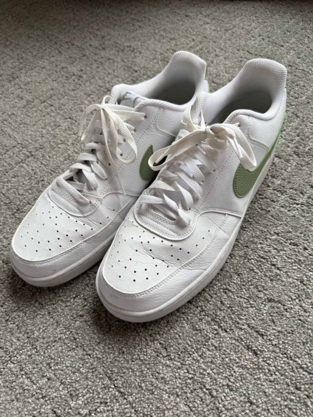 Nike White Low-Top Sneakers with Light Green Swoosh